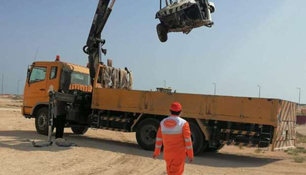 Removal of abandoned vehicles, equipment in Al Shamal
