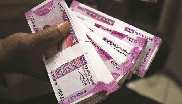 The rupee pared early gains to settle 16 paise lower at 73.64 against the US dollar yesterday