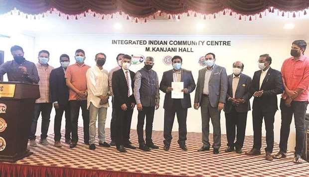 Officials at the launch of the insurance programme.