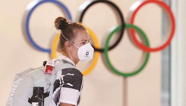 A member of Germanyu2019s rowing team arrives at the Narita airport yesterday ahead of Tokyo Olympic Games. (Reuters)