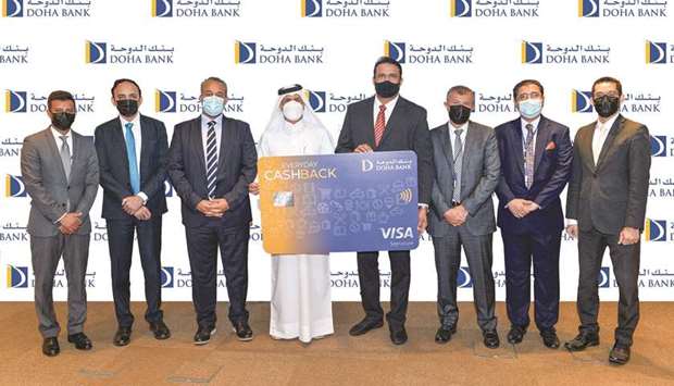 Doha Bank and Visa officials during the launch of the Doha Bank Visa Signature Everyday Cashback credit card.