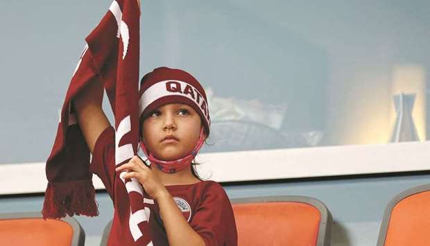 A young Qatar fan looks on prior to the CONCACAF Gold Cup Prelims football match between Qatar and Panama on July 13, 2021 at BBVA Stadium in Houston, Texas.