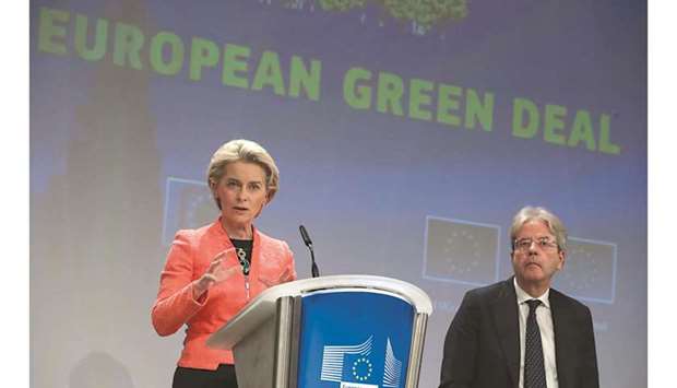European Commission President Ursula von der Leyen presents the EUu2019s new climate policy proposals with EU Commissioner Paolo Gentiloni next to her, in Brussels yesterday. (Reuters)