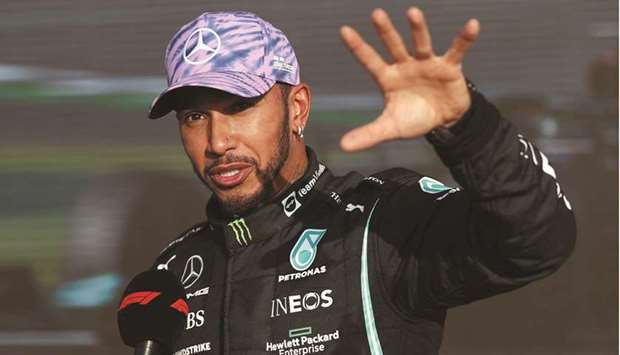 Mercedesu2019 Lewis Hamilton talks to the media after finishing first in the sprint race qualifying of the British GP at the Silverstone Circuit, Silverstone, Britain, yesterday. (Reuters)