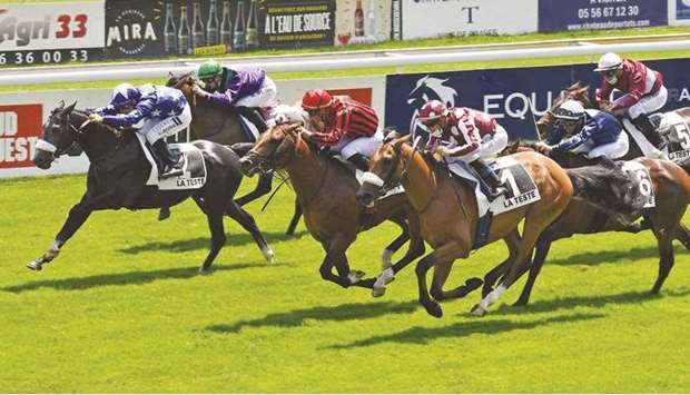 Jockey Julian Auge rides Moharram to victory in the Group Three Prix Tidjani at La Teste de Buch, France, yesterday. (Robert Polin)