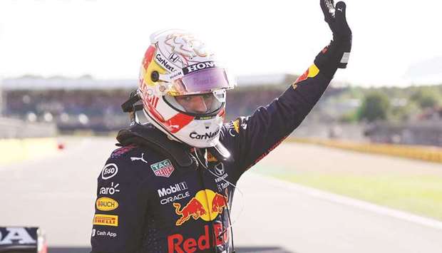 Red Bullu2019s Max Verstappen celebrates after winning sprint qualifying of the British Grand Prix at the Silverstone Circuit in Silverstone, Britain, yesterday. (Reuters)