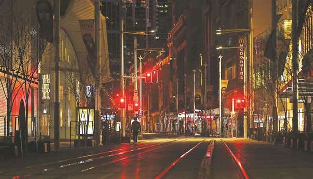 A quiet George Street promenade is pictured on a usually busy evening in Sydney yesterday.