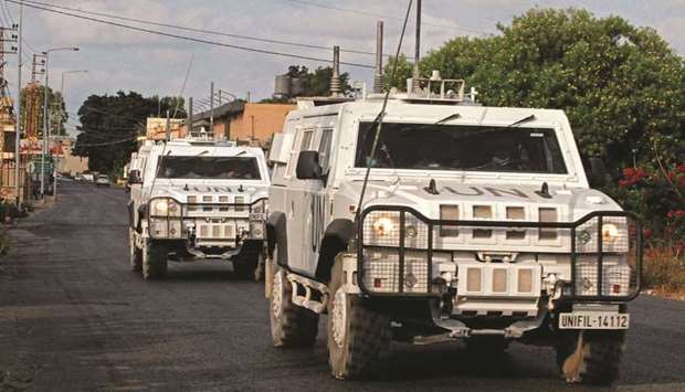 A unit of the United Nations peacekeeping force in Lebanon (UNIFIL) patrols the coastal Qlaileh village in the south of Lebanon, yesterday.
