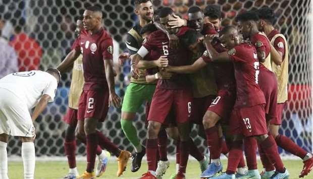 Qatar midfielder Abdelaziz Hatim (6) celebrates his goal with teammates against Honduras in the second half during a CONCACAF Gold Cup group stage soccer match at BBVA Stadium.  PICTURE: Thomas Shea-USA TODAY Sports