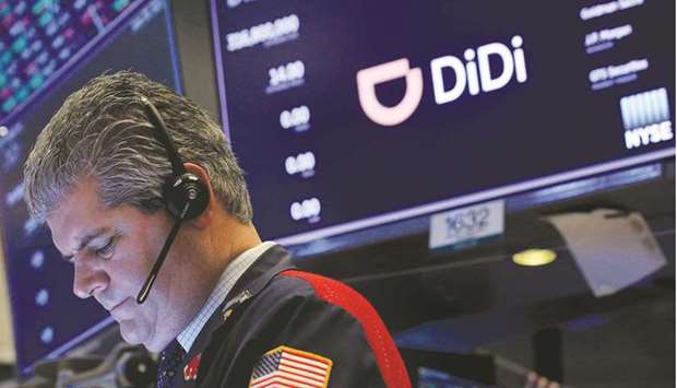 A trader works during the IPO for Chinese ride-hailing company Didi Global on the New York Stock Exchange floor on June 30.