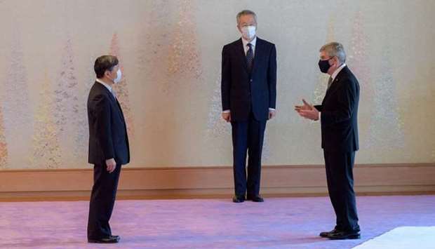 International Olympic Committee President Thomas Bach talks with Japan's Emperor Naruhito at the Imperial Palace in Tokyo, Japan yesterday.  Imperial Household Agency of Japan/Handout via REUTERS