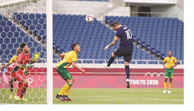 Andre-Pierre Gignac of France scores his second goal against South Africa at the Saitama Stadium yesterday. (Reuters)