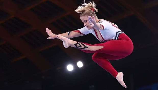 Elisabeth Seitz of Germany in action on the balance beam. REUTERS/Mike Blakernrnrn