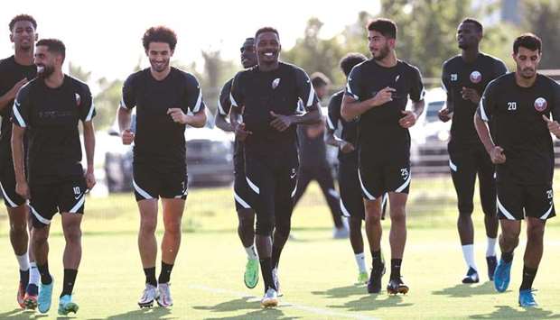 Qatar players train in Austin on Wednesday, on the eve of their Concacaf Gold Cup semi-final against the United States.