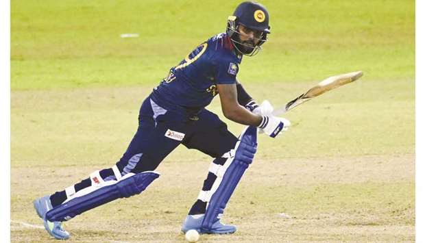 Sri Lankau2019s Wanindu Hasaranga plays a shot during the third Twenty20 against India at the R. Premadasa Stadium in Colombo yesterday. (AFP)