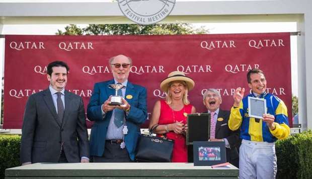 Abdullah bin Mohamed al-Attiyah (left), Academic Affairs Counsellor of the Military Attachu00e9 of the Embassy of Qatar in the United Kingdom, with the winners of the Qatar Lillie Langtry Stakes (Group 2) after Wonderful Tonight won the 2,800m feature at Qatar Goodwood Festival Saturday. (Toby Adamson)