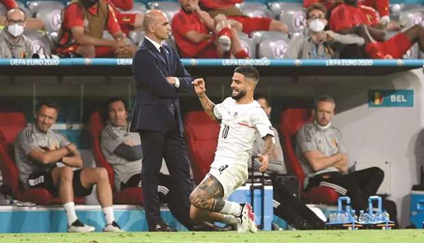 Italyu2019s Lorenzo Insigne celebrates after scoring their second goal during their Euro 2020 quarter-final against Belgium in Munich on Friday. (Reuters)