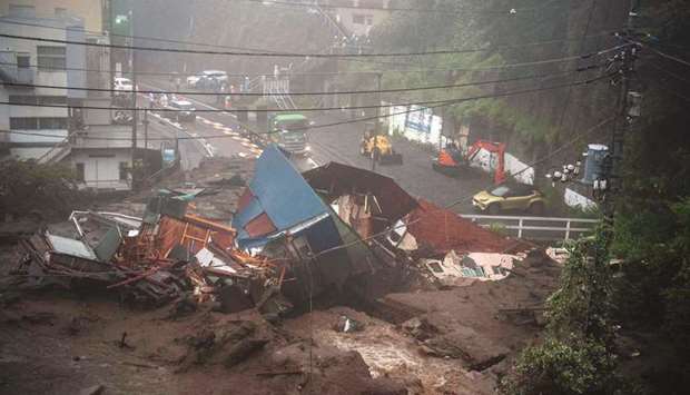 Mud and debris are seen at the scene of a landslide following days of heavy rain in Atami, Shizuoka prefecture.