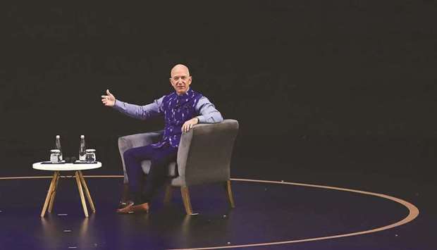 Jeff Bezos, CEO of Amazon.com, speaks during an event in New Delhi, India (file). Bezos will retain a key role as executive chair at the technology and e-commerce colossus he founded 27 years ago.