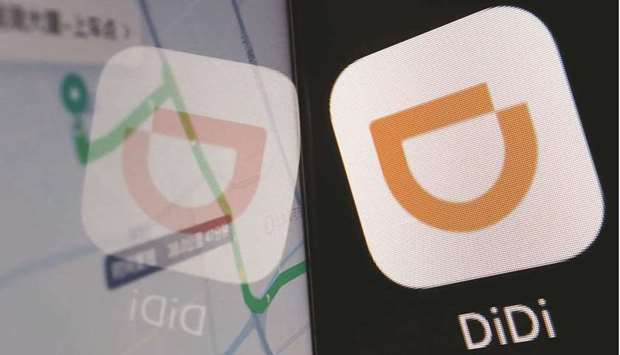 The app logo of Didi is seen reflected on its navigation map displayed on a mobile phone in an illustration picture. Chinau2019s cyberspace regulator ordered app stores to remove Didi Chuxing, dealing a major blow to a ride-hailing giant that just days ago pulled off one of the largest US initial public offerings of the past decade.