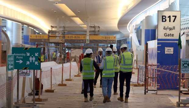 (File Photo) Visitors tour the construction site of the midfield terminal of Abu Dhabi International Airport in Abu Dhabi