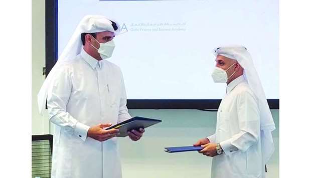 HE the ACTA President Hamad bin Nasser al-Misnad and QFBA chief executive Dr Khalid al-Horr at the MoU signing ceremony.