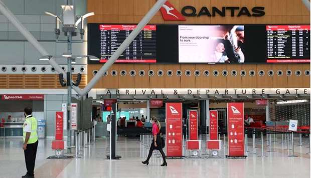 A mostly empty domestic terminal at Sydney Airport is seen after surrounding states shut their borders to New South Wales in response to an outbreak of the coronavirus disease in Sydney, Australia, December 21, 2020