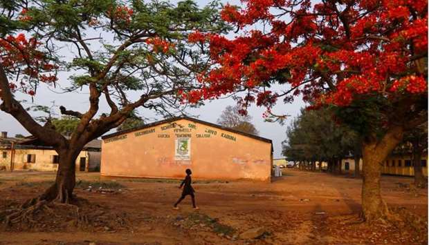 A boy walks inside the premises of a Teachers Training College in Kaduna, Nigeria on April 29. REUTERS