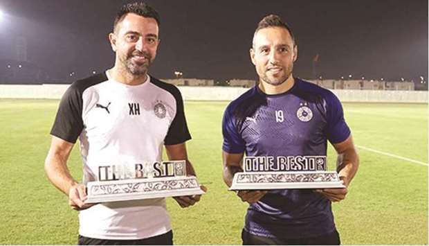 Xavi Hernandez (left) and Santi Cazorla.