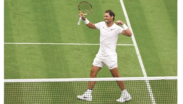 Spainu2019s Rafael Nadal celebrates winning against Lithuaniau2019s Ricardas Berankis on the fourth day of the 2022 Wimbledon Championships at The All England Tennis Club in southwest London, yesterday. (Reuters)