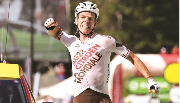 AG2R Citroen Teamu2019s Luxembourgish rider Bob Jungels celebrates as he cycles to the finish line to win the 9th stage of the 109th edition of the Tour de France cycling race at Chatel Les Portes du Soleil in the French Alps yesterday. (AFP)