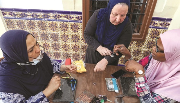 A Libyan man crafts a piece of traditional filigree jewellery at a workshop in the capital Tripoli. 