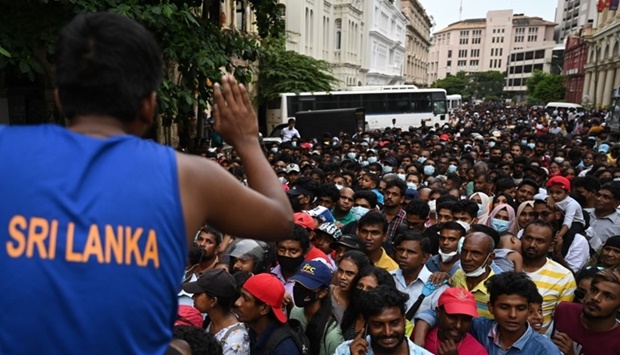 People crowd to visit Sri Lankan President Gotabaya Rajapaksa's official residence in Colombo on July 11, after it was overrun by anti-government protestors. AFP