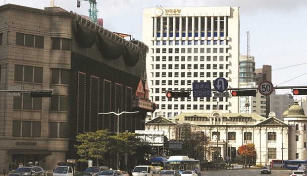 The Bank of Korea headquarters in Seoul. A large majority of economists see the BoK raising its benchmark interest rate by a half-percentage-point today, doubling the pace of its policy  tightening to rein in inflation running at a 23-year high.