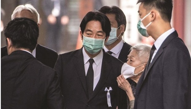 Taiwanese Vice President William Lai (C) attends the funeral of late former Japanese prime minister Shinzo Abe at the Zojoji Temple in Tokyo yesterday. (AFP)