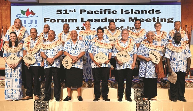 Leaders pose for photographs after the Traditional Ceremonies of Welcome at the Pacific Islands Forum (PIF) in Suva, yesterday.