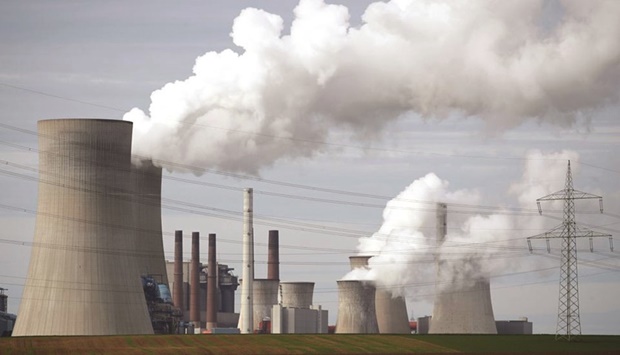 Steam rises from the five brown coal-fired power units of RWE, one of Europeu2019s biggest electricity companies in Neurath, north-west of Cologne, Germany, in March. (Reuters)