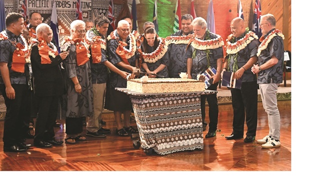 Leaders cut a cake after the launch of the 2050 Strategy during the Pacific Islands Forum (PIF) in Suva yesterday.