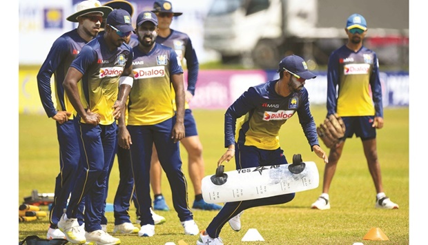 Sri Lankau2019s Dhananjaya de Silva (second right) takes part in a practice session ahead of the first Test against Pakistan at the Galle International Cricket Stadium in Galle yesterday. (AFP)