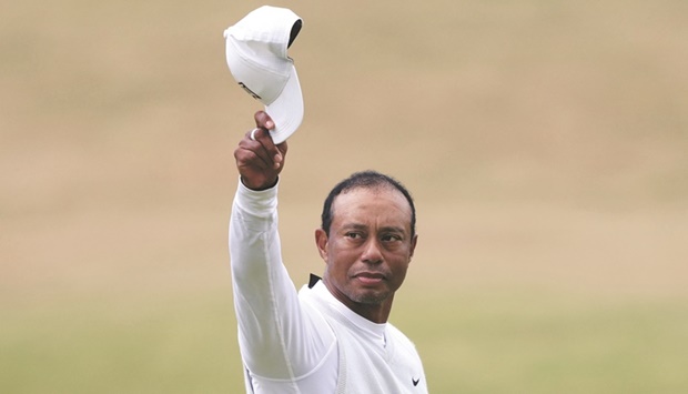 Tiger Woods of the US acknowledges the fans after completing his second round at the 150th Open Championship. (Reuters)