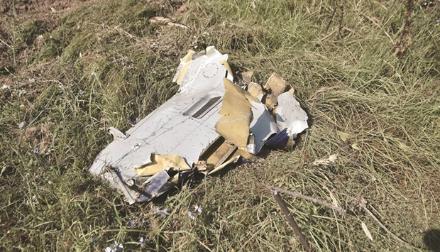 Debris on the crash site yesterday of an Antonov An-12 cargo aircraft a few kilometres away from the city of Kavala in Greece.