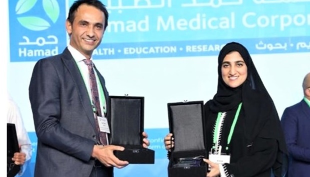 The award was collected by Dr. Raed Amro, Assistant Executive Director of the Mental Health Service at the MHS on behalf of HMC