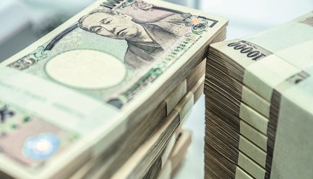 Bundles of Japanese yen banknotes. The path of the yen is being closely-watched by markets, with bets on a further decline increasingly seen as the most stretched macro trade, according to a recent Bank of America survey of fund managers.