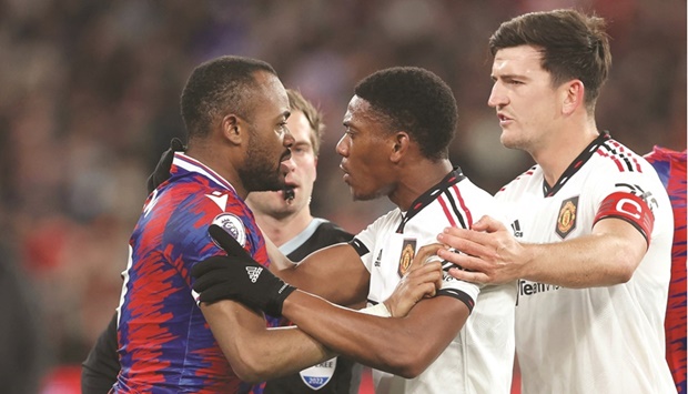 Manchester Unitedu2019s Anthony Martial (second right) argues with Crystal Palaceu2019s  Jordan Ayew during the friendly at the Melbourne Cricket Ground yesterday. (AFP)