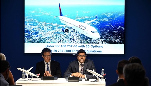 Senior vice president of Commercial Sales & Marketing for The Boeing Company, Ihssane Mounir (L) and Senior Vice President of Fleet & TechOps Supply Chain for Delta Air Lines Mahendra Nair speak during a press conference at the Farnborough Airshow, in Farnborough. AFP