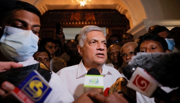 Ranil Wickremesinghe who has been elected as the Eighth Executive President under the Constitution speaks to media as he leaves a Buddhist temple, amid the country's economic crisis, in Colombo, Sri Lanka. REUTERS