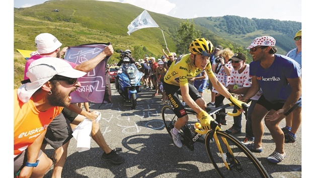 Vismau2019s Jonas Vingegaard (also inset) in action before winning stage 18 of the Tour de France from Lourdes to Hautacam in France yesterday. (Reuters)