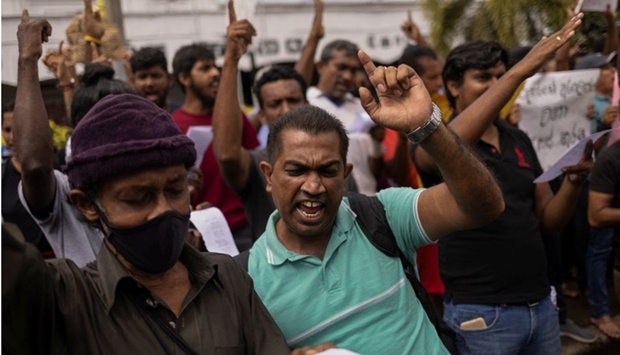 Protestors shout slogans during a protest against the raid on an anti-government protest camp early on Friday, amid the country's economic crisis, near Presidential Secretariat in Colombo, Sri Lanka. REUTERS