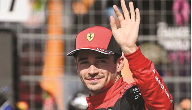 Ferrariu2019s Monegasque driver Charles Leclerc celebrates after he took the pole position during the qualifying session ahead of the French Formula One Grand Prix at the Circuit Paul Ricard in Le Castellet, southern France, on Saturday. (AFP)