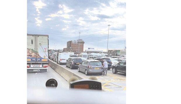 This still image obtained from a social media video shows long queues of vehicles in Dover.
